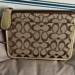 Elegant Coach Brown and Gold Patterned Wallet Keychain
